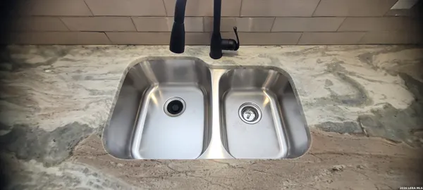 a kitchen with a stove and a microwave