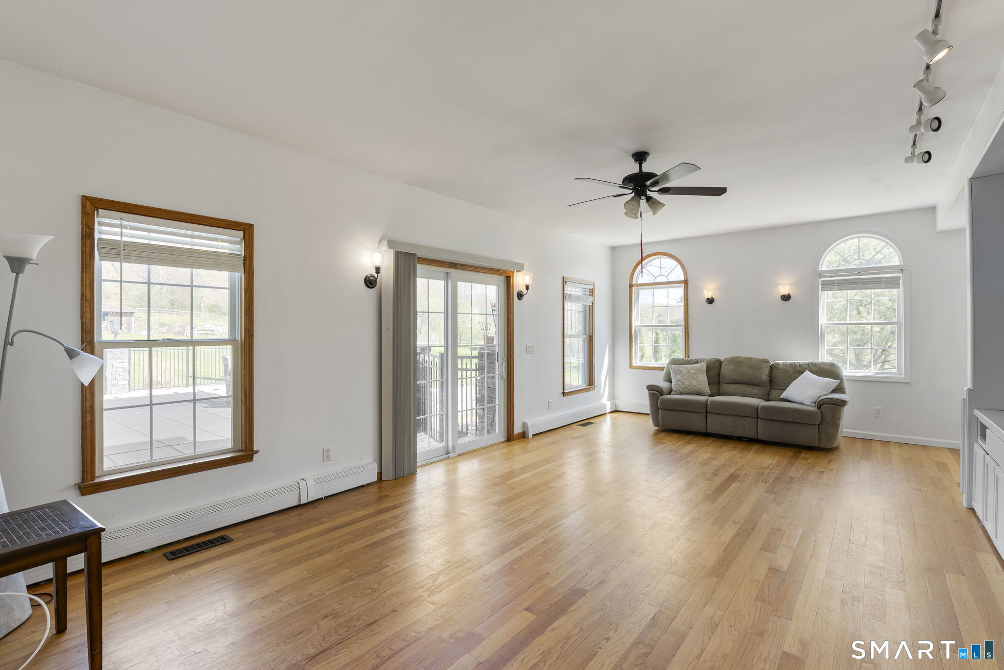 341 High Street Extension Thomaston, CT 06787 - Photo 14 of 39 a living room with furniture and a large window