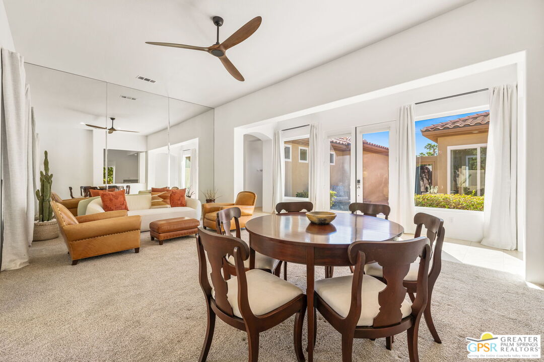 30 Vía Cielo Azul Palm Desert, CA 92260 - Photo 13 of 40 a view of a dining room with furniture