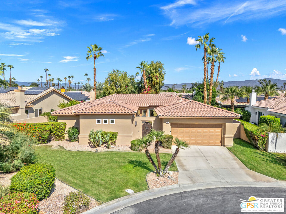 30 Vía Cielo Azul Palm Desert, CA 92260 - Photo 6 of 40 a front view of a house with garden