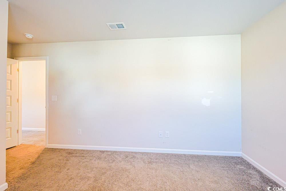 1560 Swing Bridge Way Myrtle Beach, SC 29588 - Photo 22 of 35 Empty room with light carpet