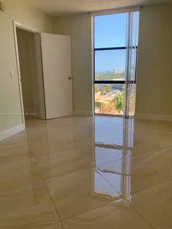 a view of walk in closet with window