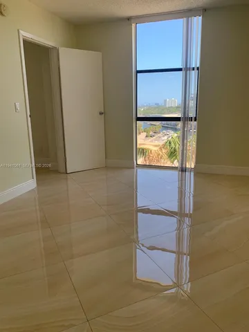 a view of walk in closet with window