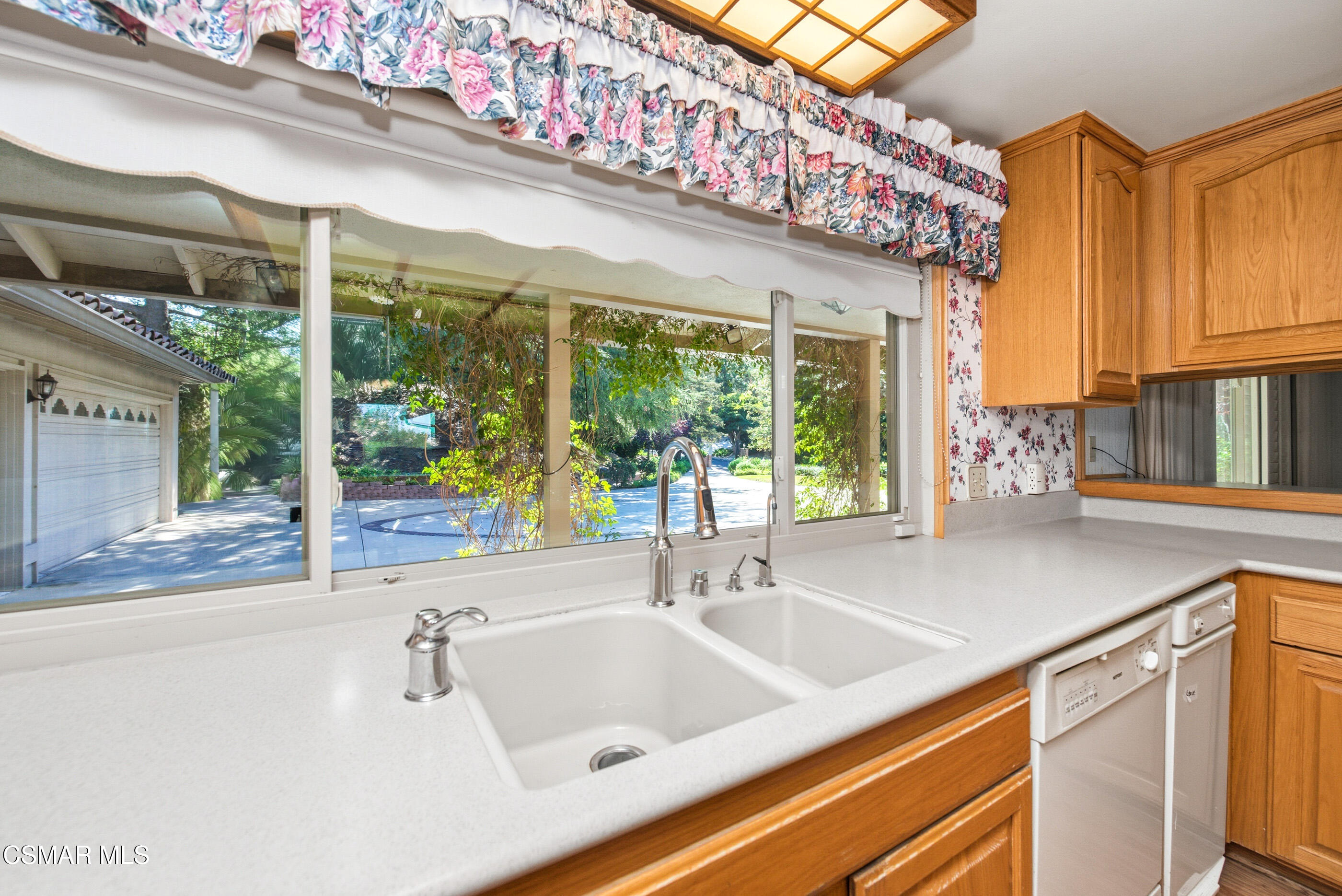 39 Inverness Road Thousand Oaks, CA 91361 - Photo 16 of 69 a bathroom with a sink and a large window