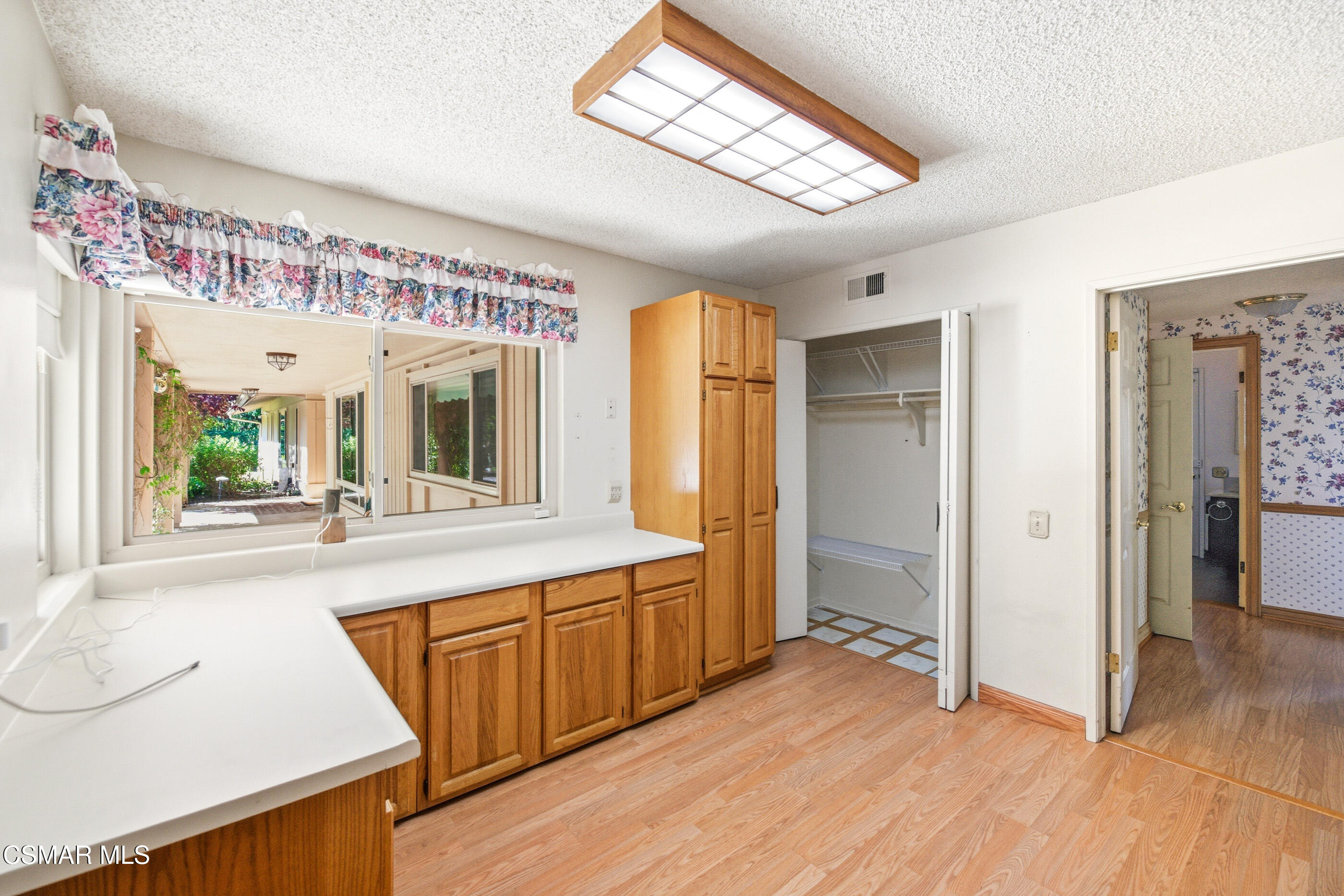 39 Inverness Road Thousand Oaks, CA 91361 - Photo 26 of 69 a kitchen with stainless steel appliances granite countertop a sink and wooden cabinets