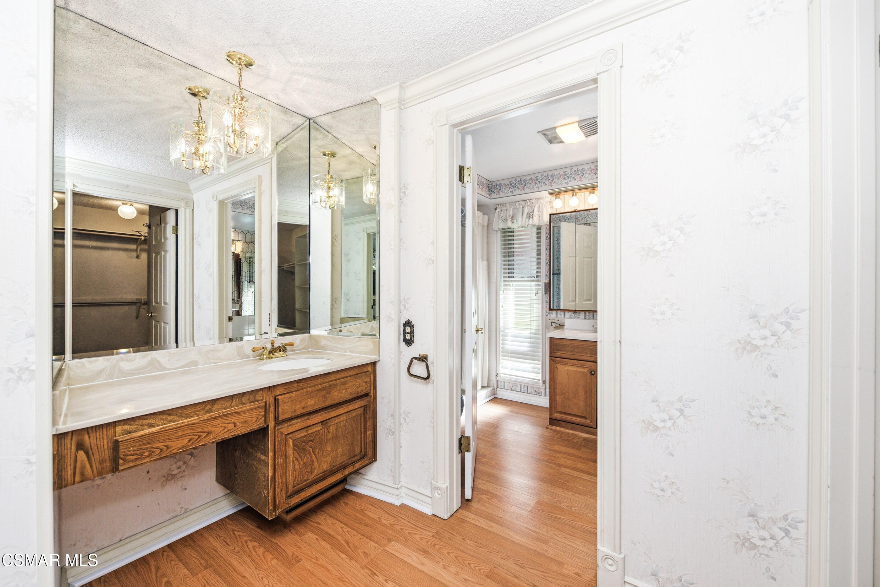 39 Inverness Road Thousand Oaks, CA 91361 - Photo 46 of 69 a bathroom with a double vanity sink and mirror