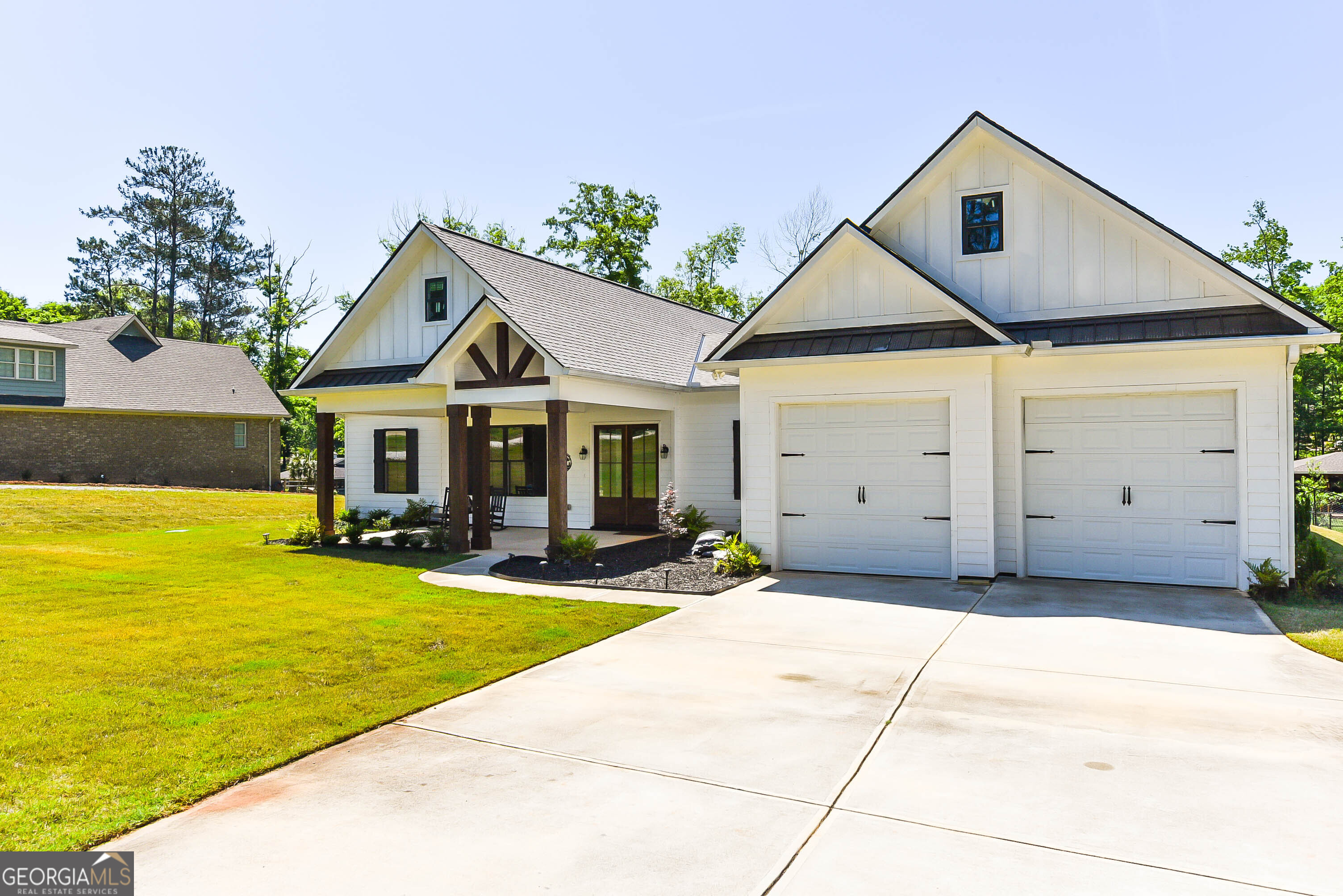 209 Lee Road Salem, AL 36874 - Photo 37 of 37 a front view of house with yard outdoor seating and barbeque oven