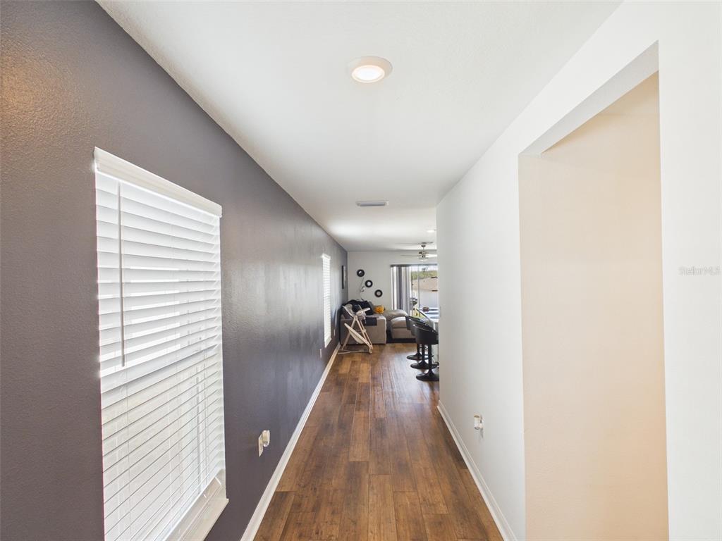 5194 Sailor Road Brooksville, FL 34602 - Photo 17 of 26 a view of a hallway with wooden floor