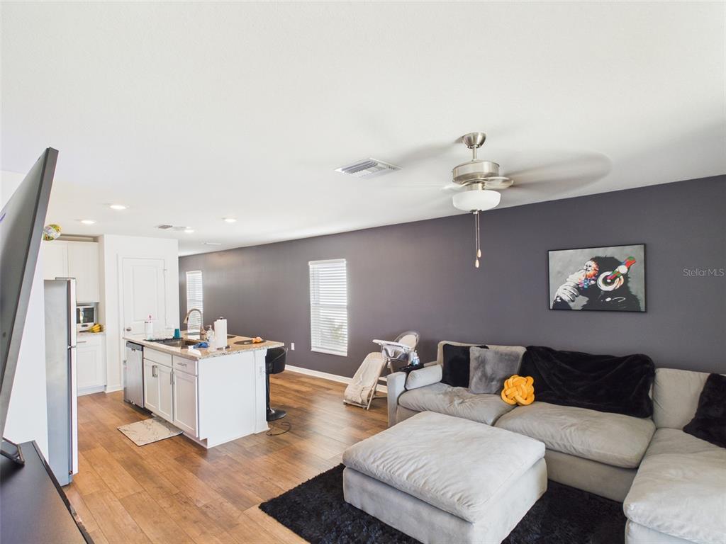 5194 Sailor Road Brooksville, FL 34602 - Photo 3 of 26 a living room with furniture and kitchen view