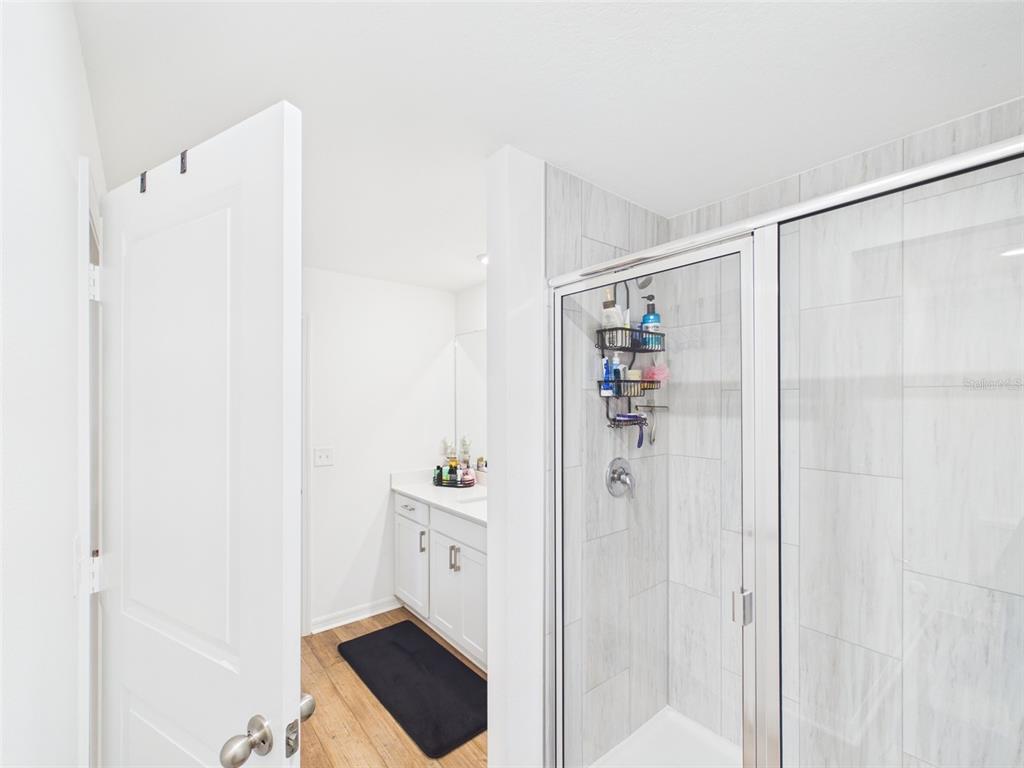 5194 Sailor Road Brooksville, FL 34602 - Photo 8 of 26 a bathroom with a shower and a sink