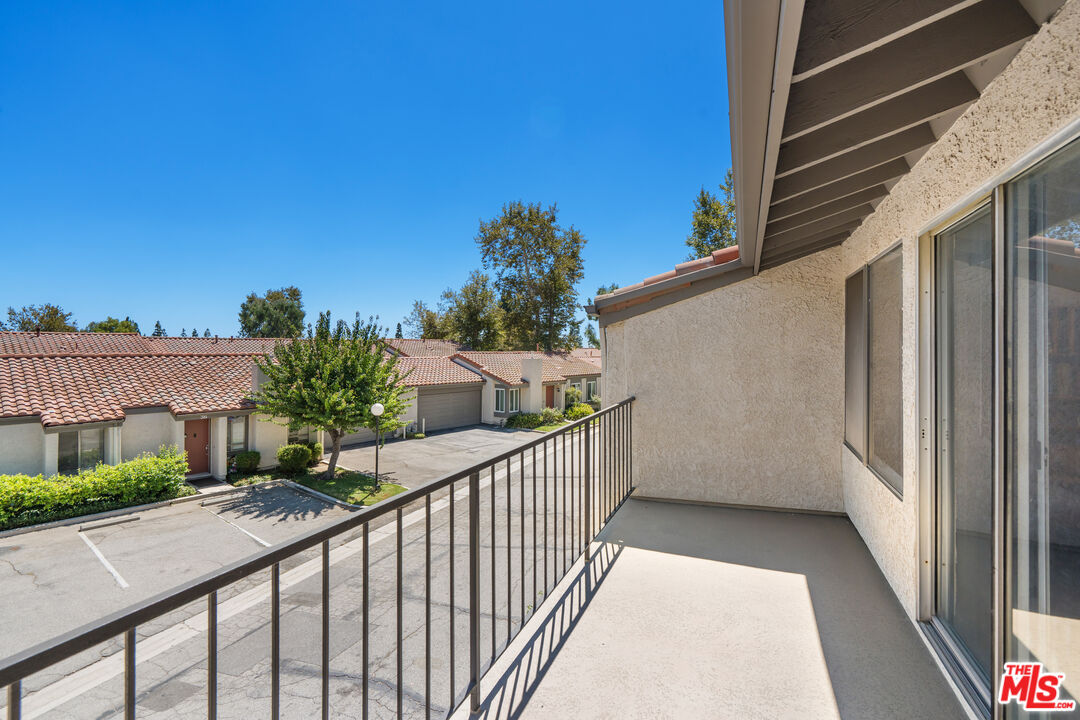 19547 Rinaldi Street, Unit 30 Porter Ranch, CA 91326 - Photo 23 of 33 a view of balcony