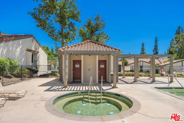 a house view with a outdoor space