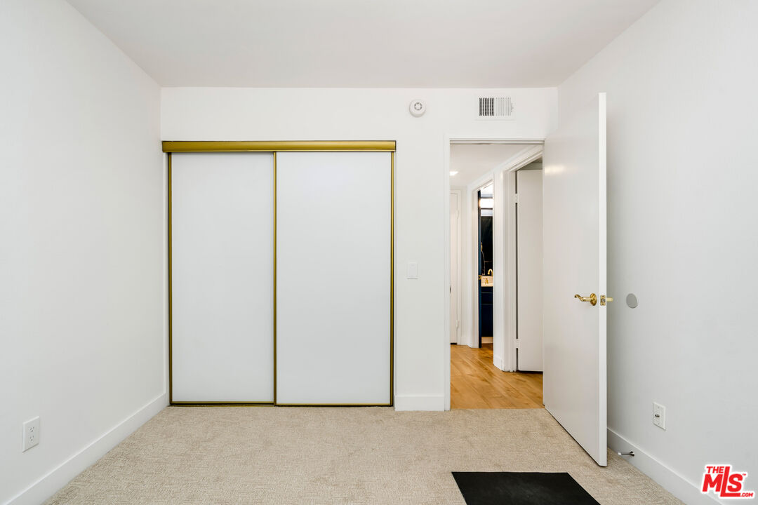 19547 Rinaldi Street, Unit 30 Porter Ranch, CA 91326 - Photo 9 of 33 a view of an empty room