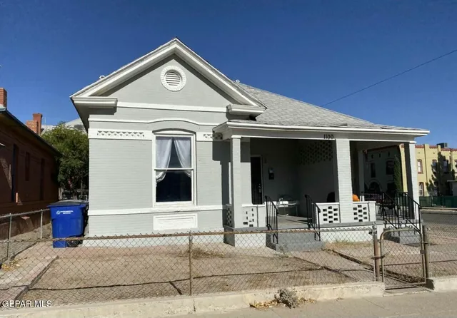 a front view of a house with garage