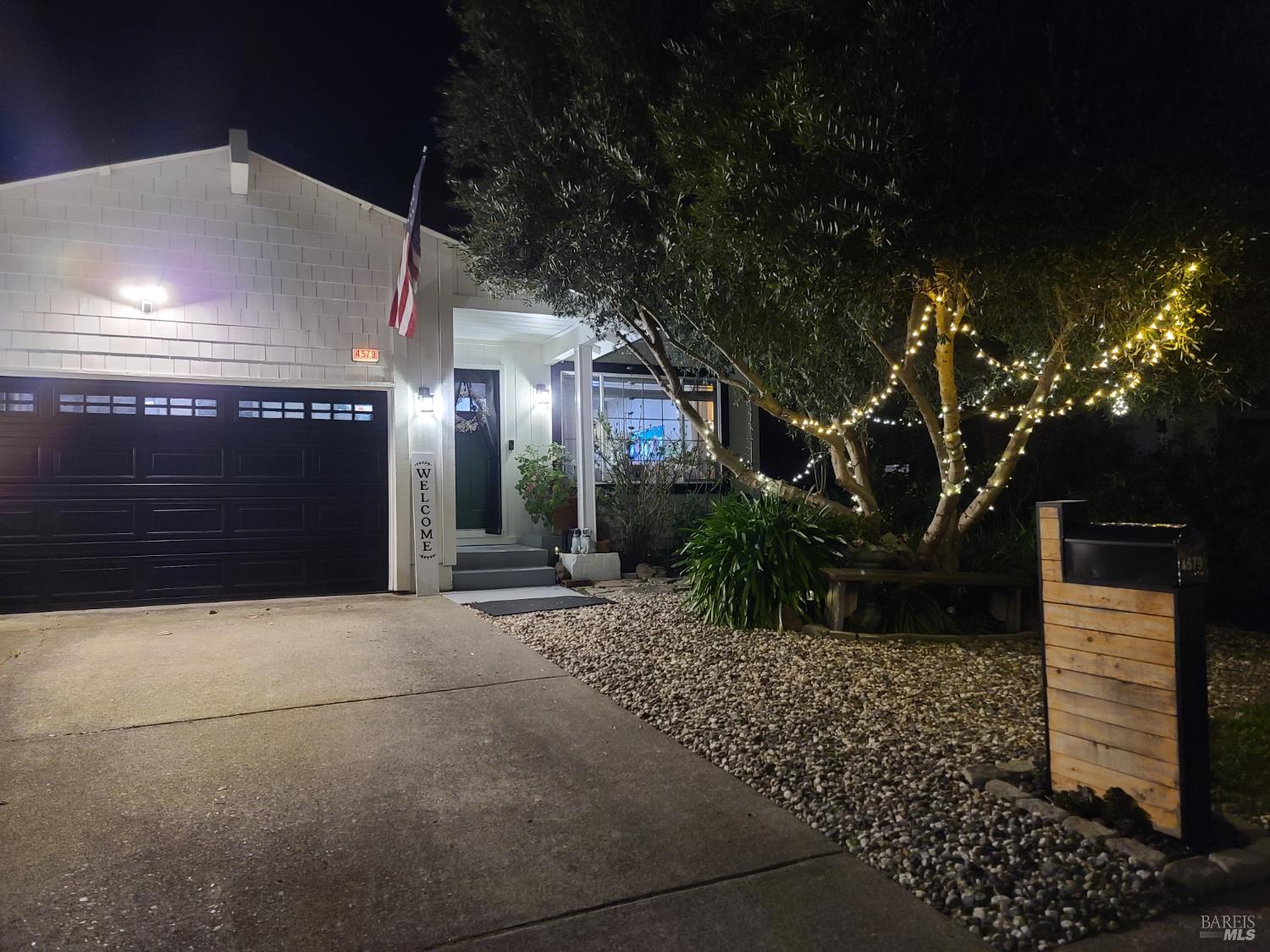 Undisclosed Address Rohnert Park, CA 94928 - Photo 2 of 38 a front view of a house with yard
