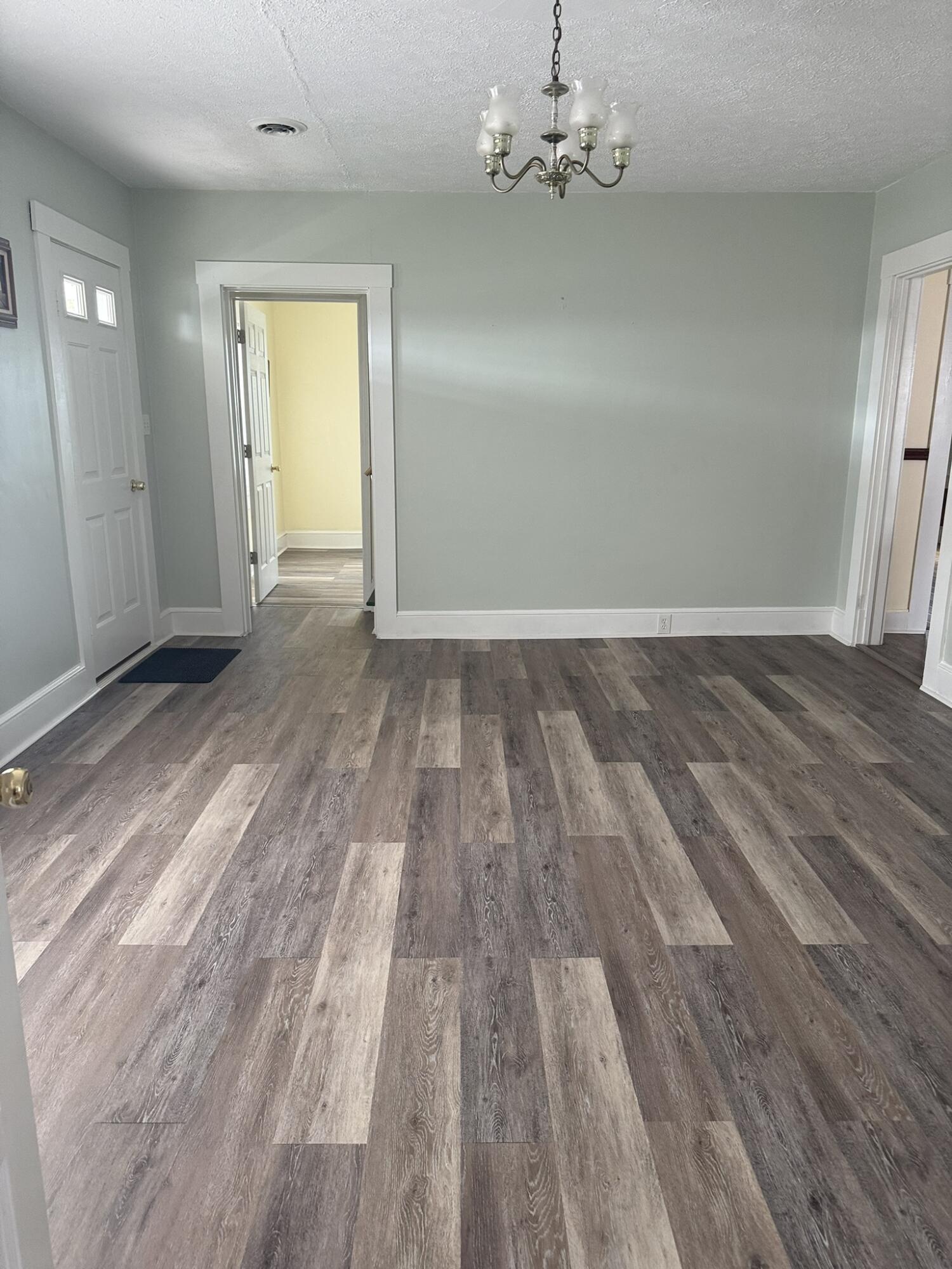 1081 East Gretna Road Gretna, VA 24557 - Photo 27 of 40 a view of empty room with wooden floor