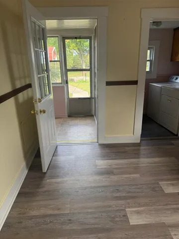 a view of a storage & utility room with a window