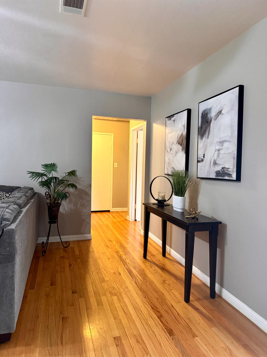 2952 Tahoe Drive Merced, CA 95340 - Photo 12 of 70 corridor featuring light wood flooring and baseboards