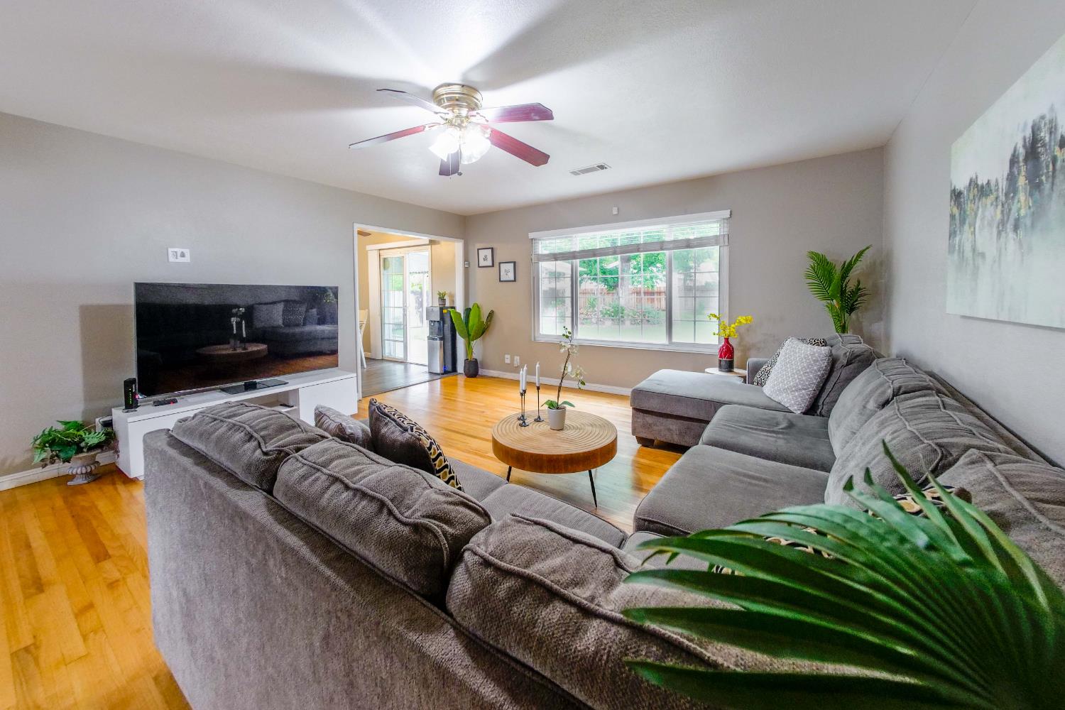 2952 Tahoe Drive Merced, CA 95340 - Photo 14 of 70 living area with light wood-style flooring and ceiling fan