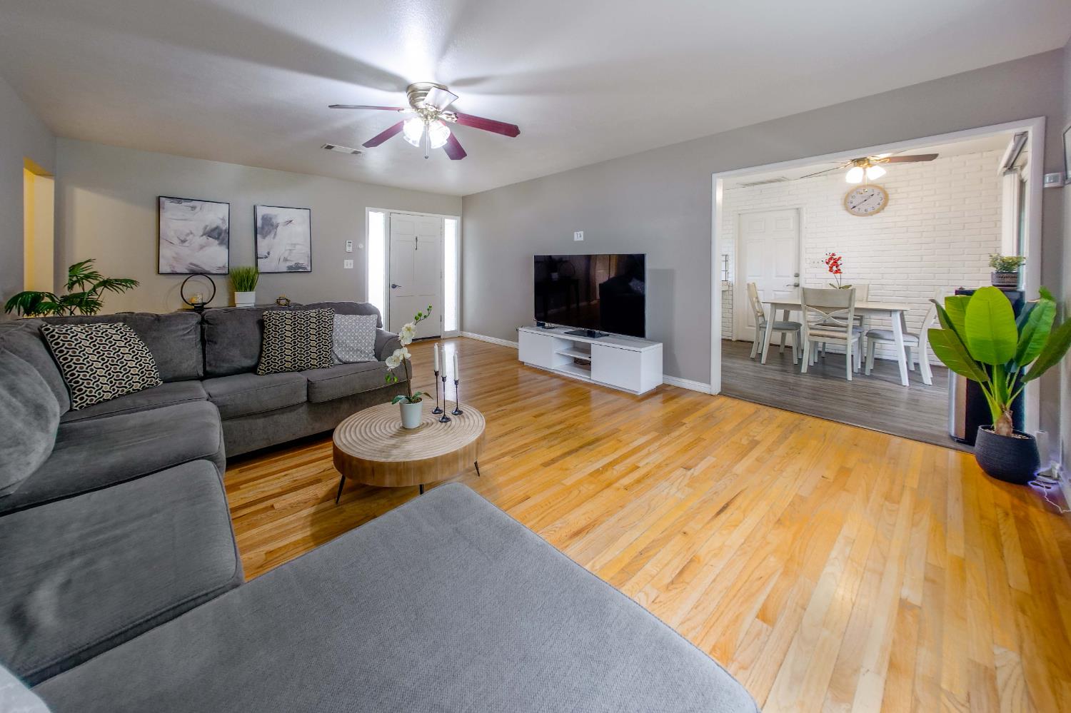 2952 Tahoe Drive Merced, CA 95340 - Photo 15 of 70 living area featuring ceiling fan and light wooden flooring