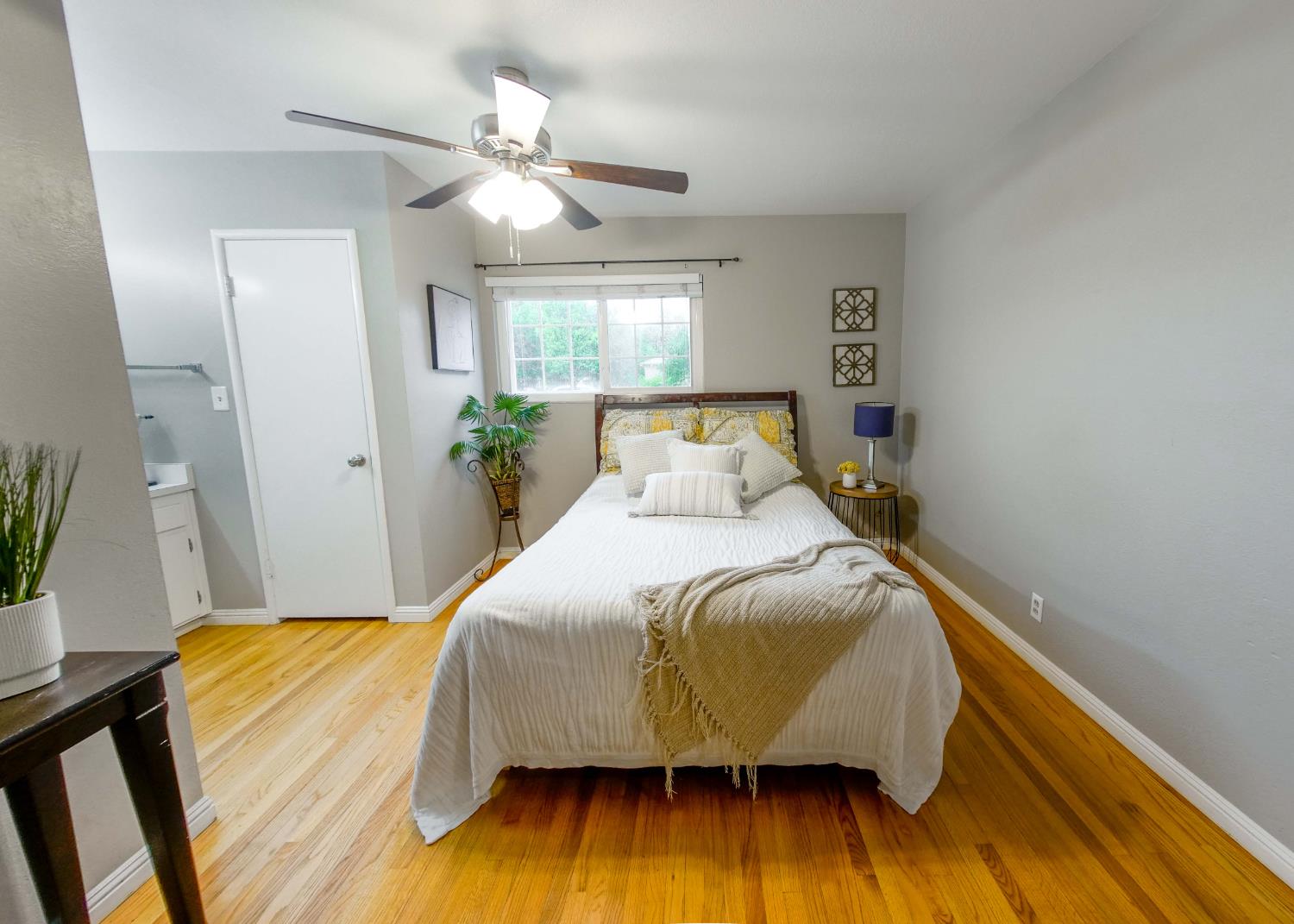 2952 Tahoe Drive Merced, CA 95340 - Photo 26 of 70 bedroom with light wood-type flooring and ceiling fan