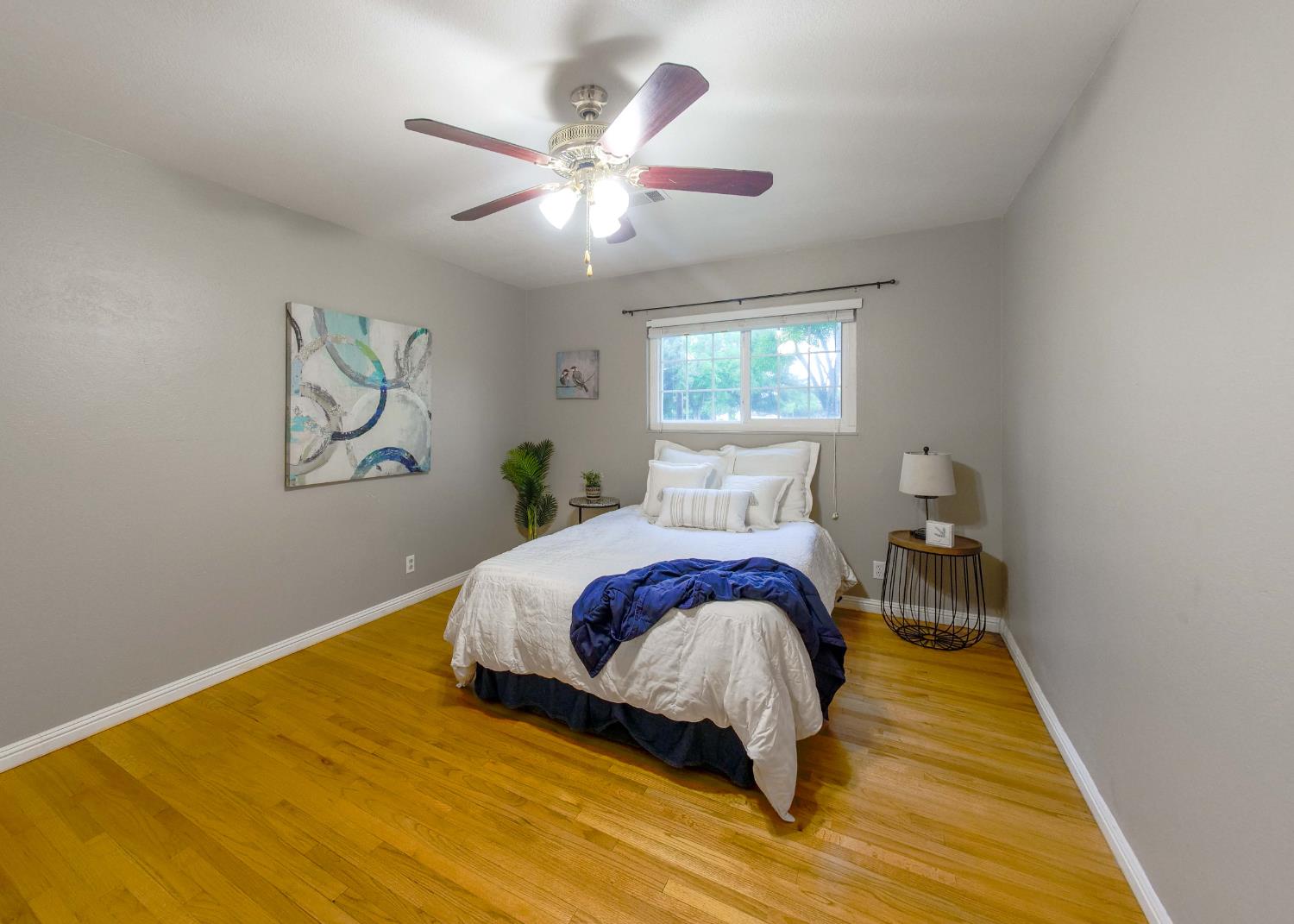 2952 Tahoe Drive Merced, CA 95340 - Photo 31 of 70 bedroom featuring light wood floors and a ceiling fan