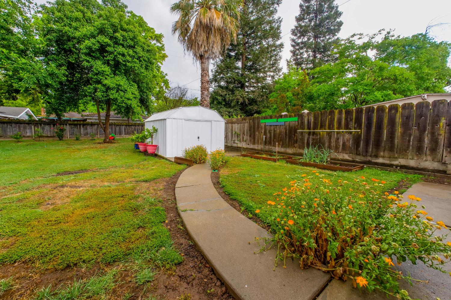 2952 Tahoe Drive Merced, CA 95340 - Photo 42 of 70 fenced backyard featuring a storage shed