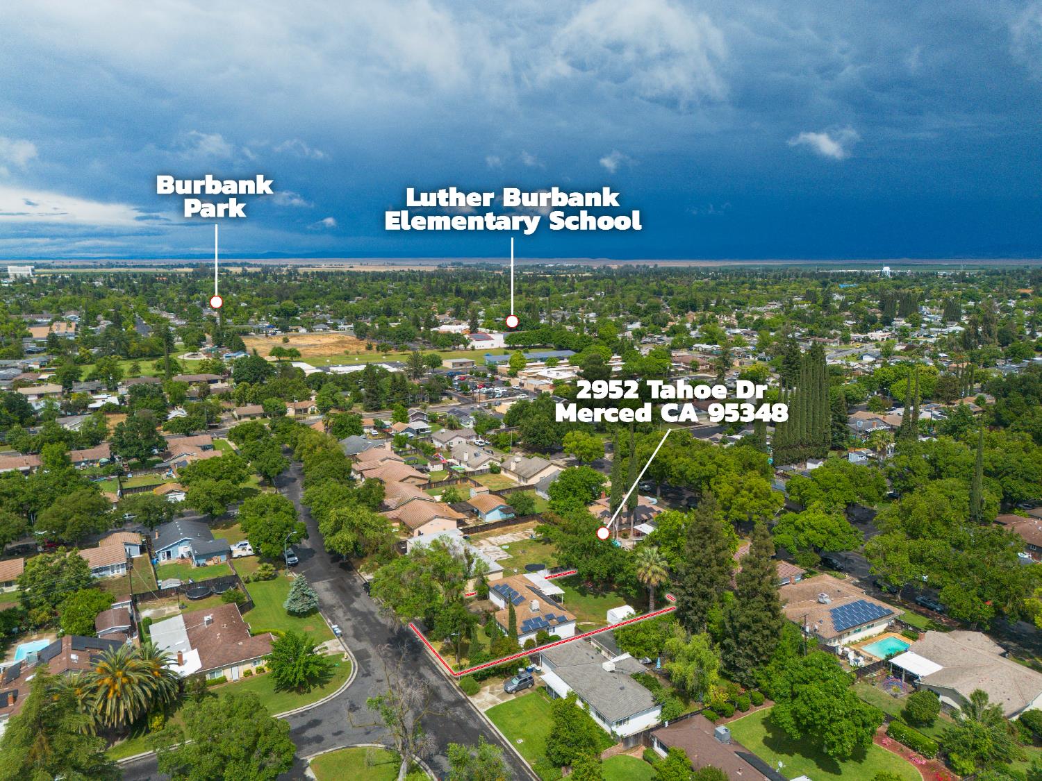 2952 Tahoe Drive Merced, CA 95340 - Photo 50 of 70 aerial perspective of suburban area with property parcel outlined