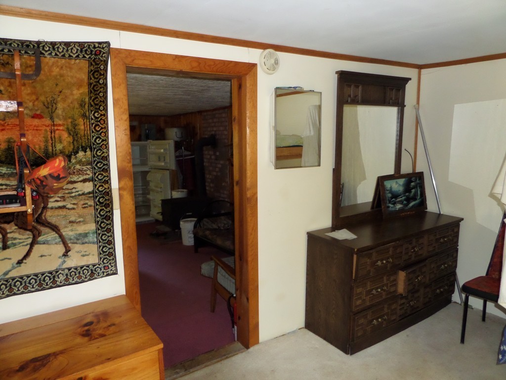 319 Harvey Road Worthington, MA 01098 - Photo 13 of 19 a living room with furniture and a mirror