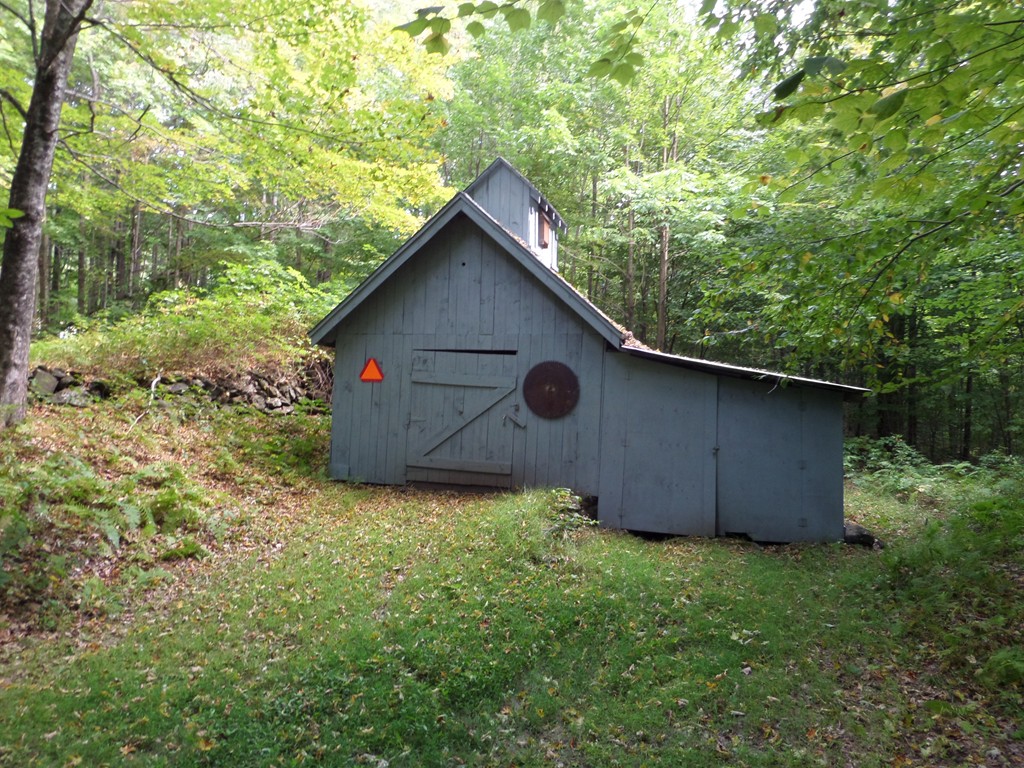 319 Harvey Road Worthington, MA 01098 - Photo 4 of 19 a house with trees in the background