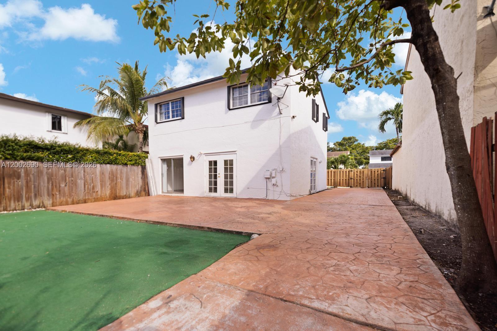 10726 Southwest 147th Court Miami, FL 33196 - Photo 20 of 23 a view of back yard of the house