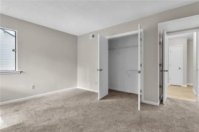 an empty room with closet