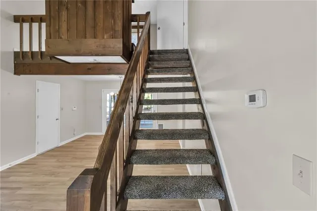 a view of entryway with wooden floor