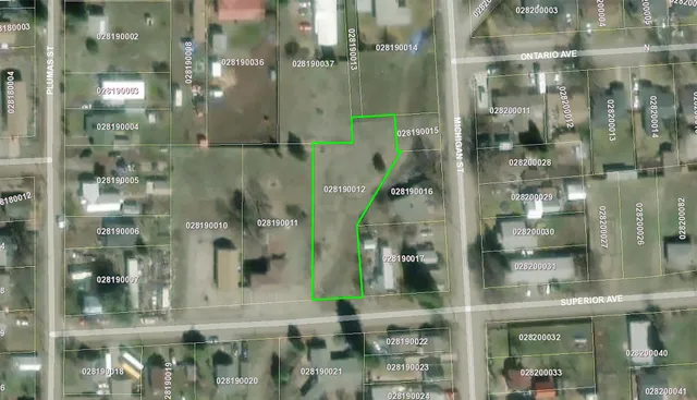 a bathroom with a glass shower door and a glass door