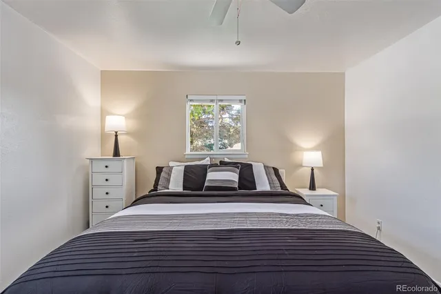 a bathroom with a sink toilet a mirror and shower
