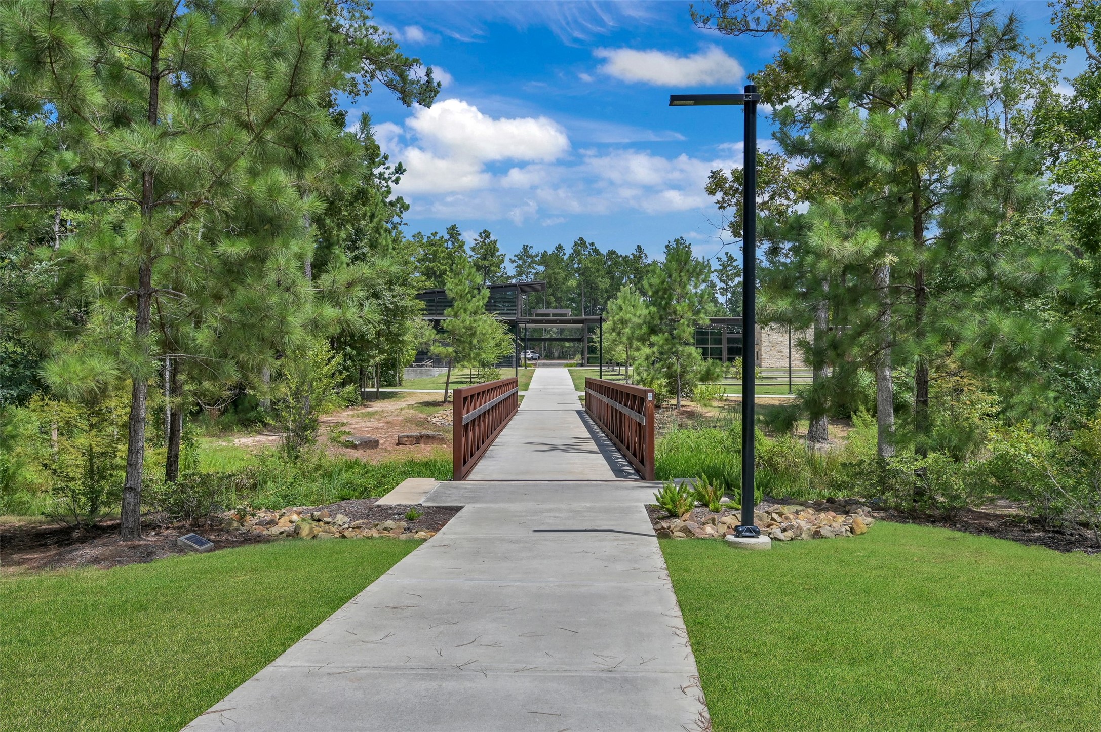 111 Yellow Perch Way Conroe, TX 77318 - Photo 31 of 35 Beautiful pathways connecting parks, amenities, and green spaces throughout The Woodlands Hills.