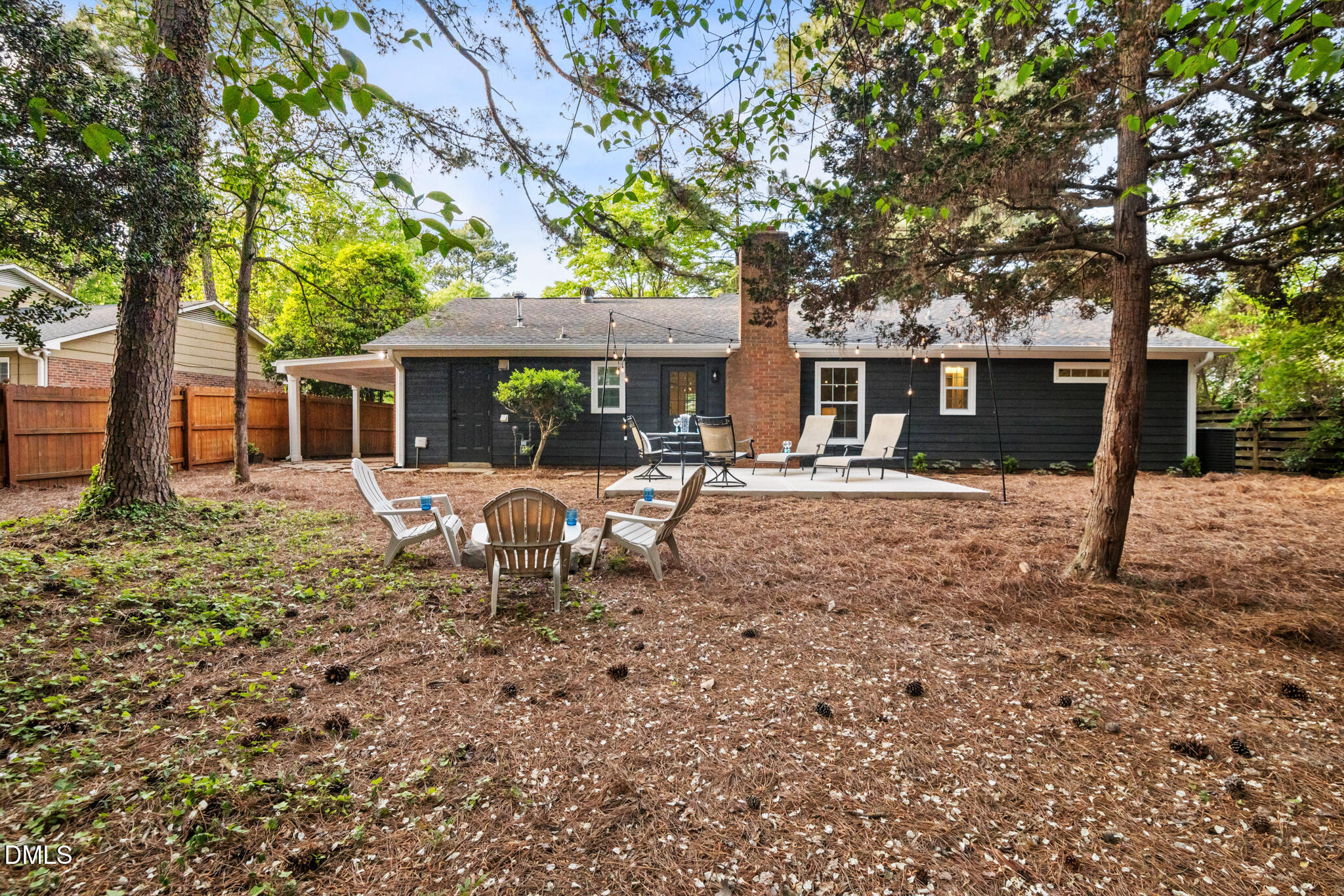 3509 Morningside Drive Raleigh, NC 27607 - Photo 9 of 49 a backyard of a house with yard and outdoor seating