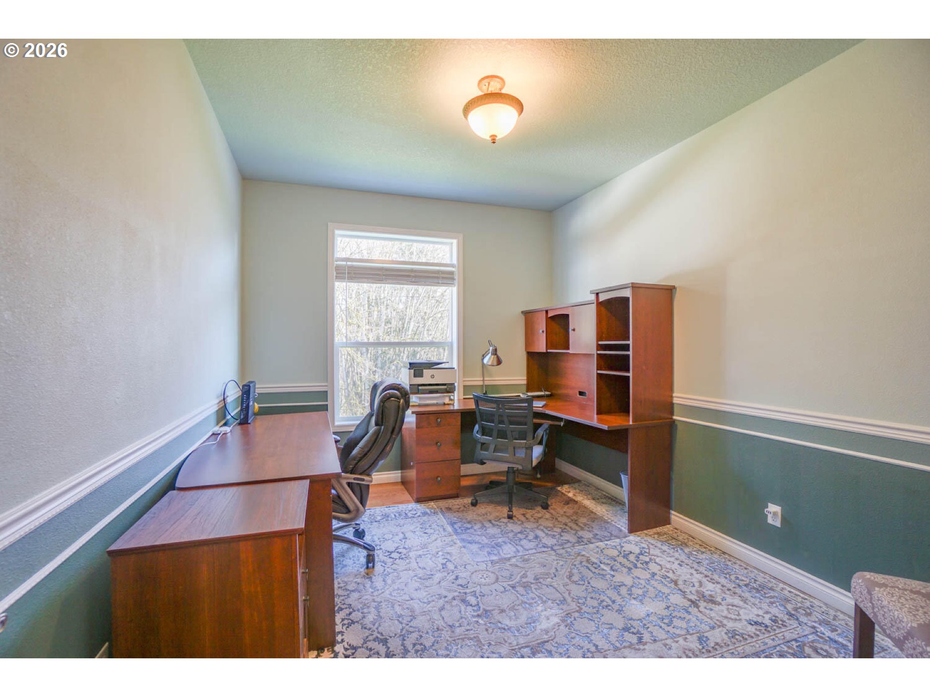 1612 North Heron Drive Ridgefield, WA 98642 - Photo 12 of 33 a workspace with furniture and window
