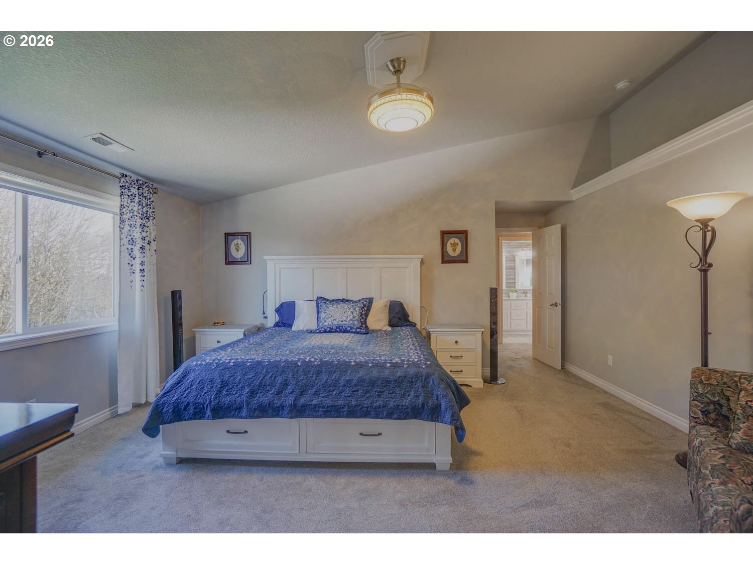 1612 North Heron Drive Ridgefield, WA 98642 - Photo 15 of 33 a spacious bedroom with a bed and a dresser