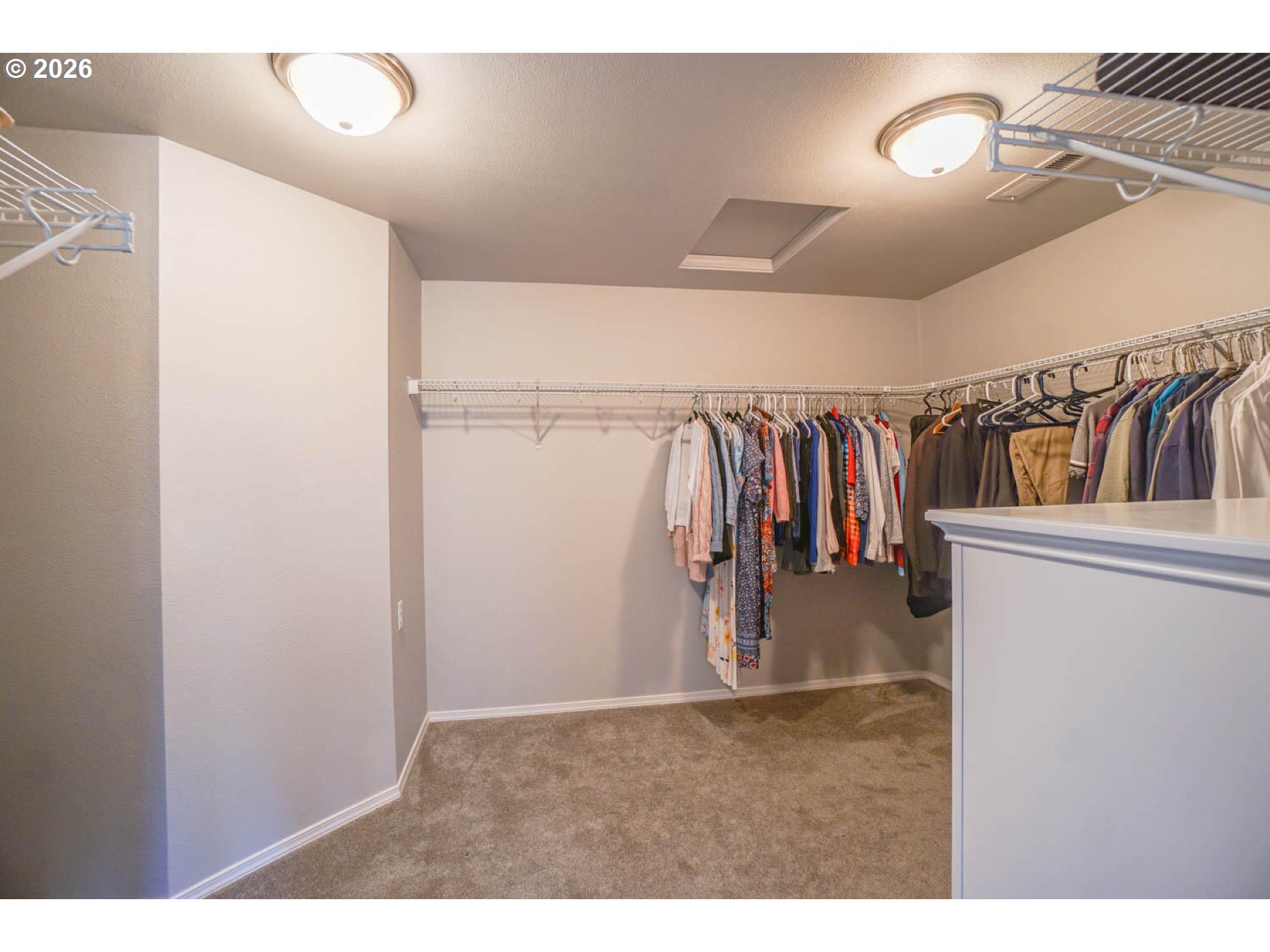 1612 North Heron Drive Ridgefield, WA 98642 - Photo 18 of 33 a view of a hallway with a white walls