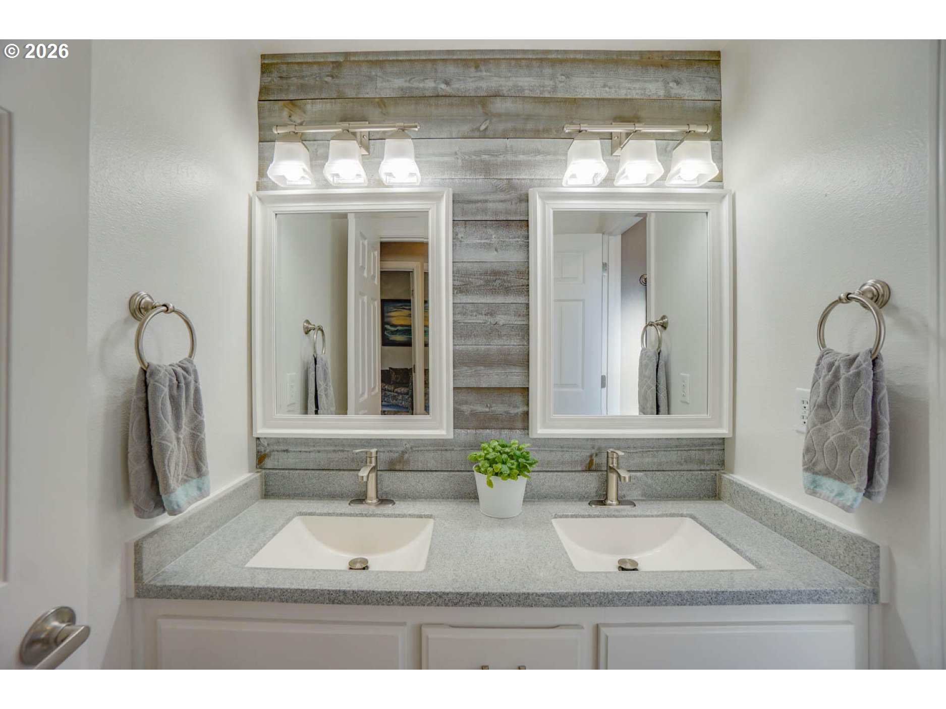 1612 North Heron Drive Ridgefield, WA 98642 - Photo 20 of 33 a bathroom with a sink and a mirror