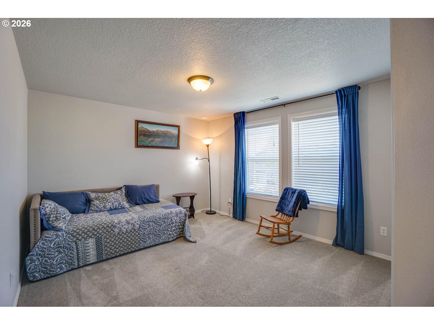 1612 North Heron Drive Ridgefield, WA 98642 - Photo 23 of 33 a living room with furniture and large windows