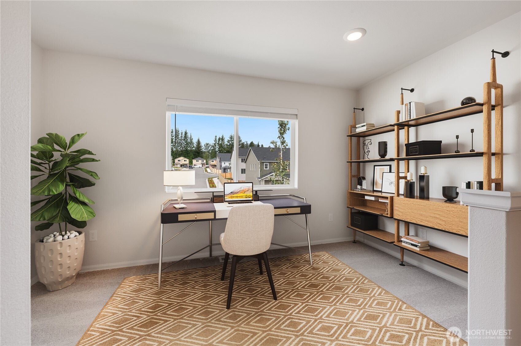 1012 15th Avenue Sultan, WA 98294 - Photo 17 of 26 a living room with furniture and a potted plant