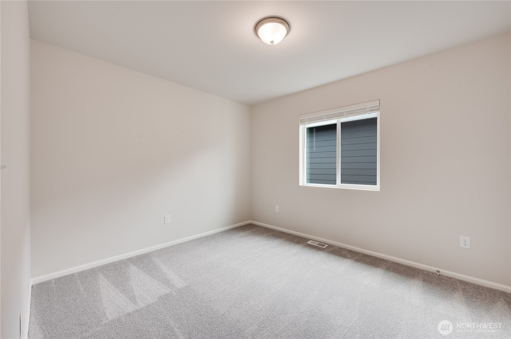 1012 15th Avenue Sultan, WA 98294 - Photo 20 of 26 an empty room with a window