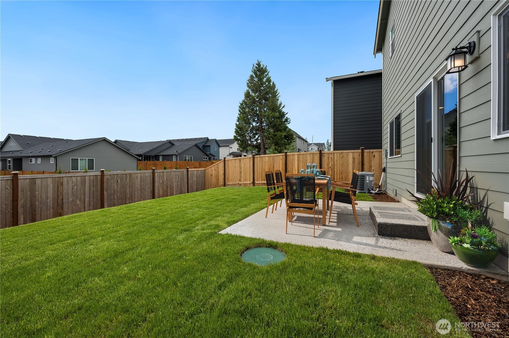 1012 15th Avenue Sultan, WA 98294 - Photo 23 of 26 a view of backyard with seating area and green space