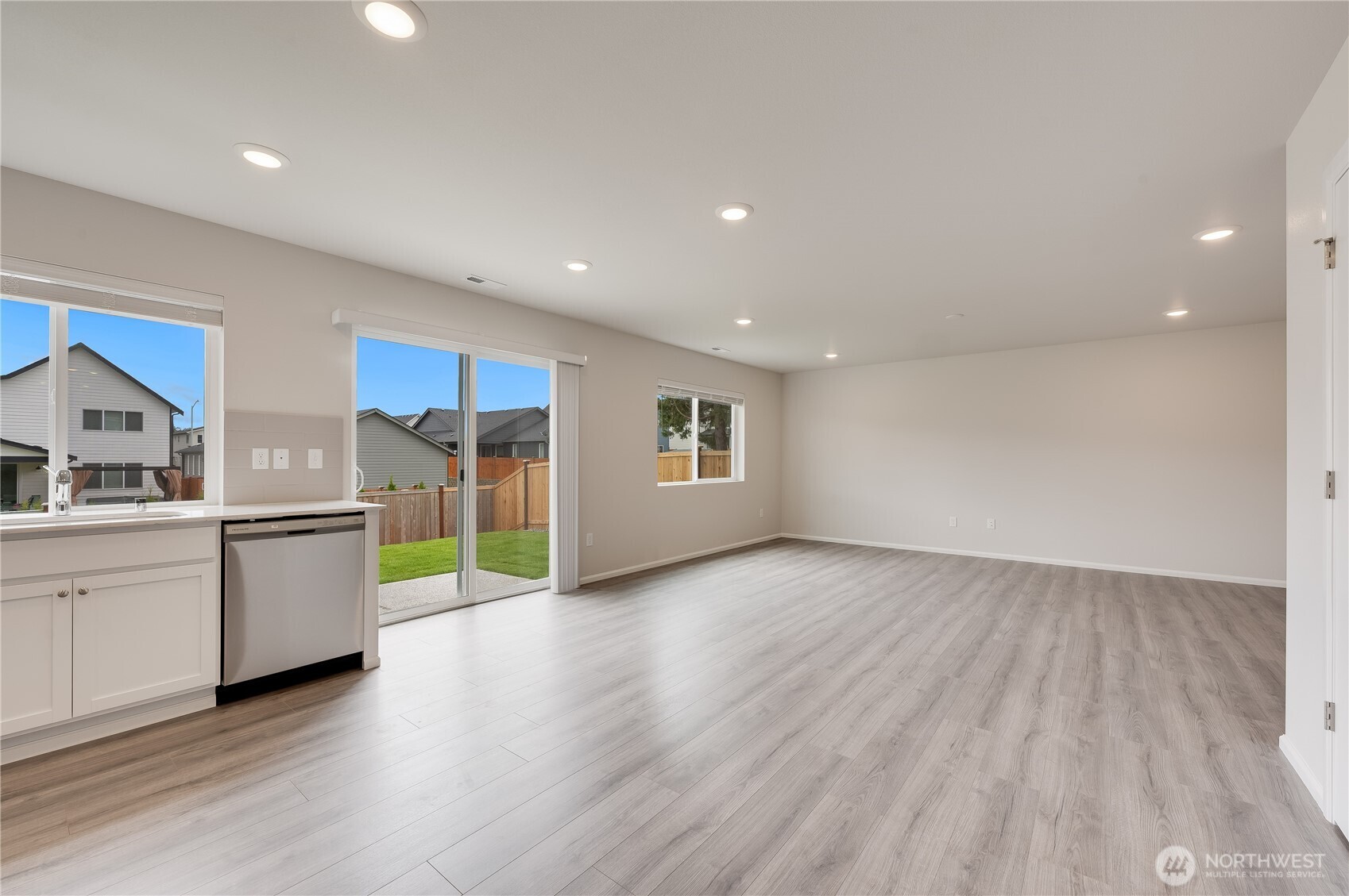 1012 15th Avenue Sultan, WA 98294 - Photo 5 of 26 a view of a kitchen with wooden floor and a sink