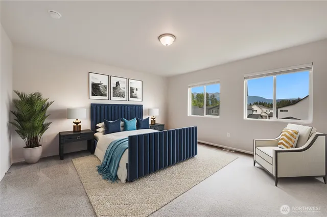 a bed room with furniture and a window