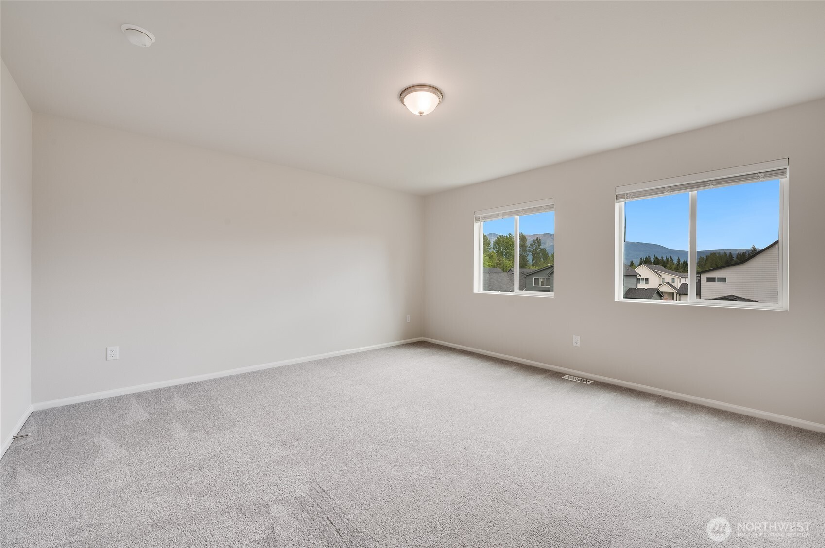 1012 15th Avenue Sultan, WA 98294 - Photo 9 of 26 an empty room with windows