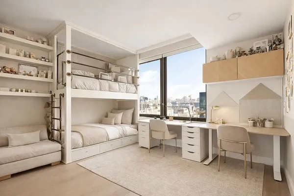a spacious bedroom with a large bed and a large window