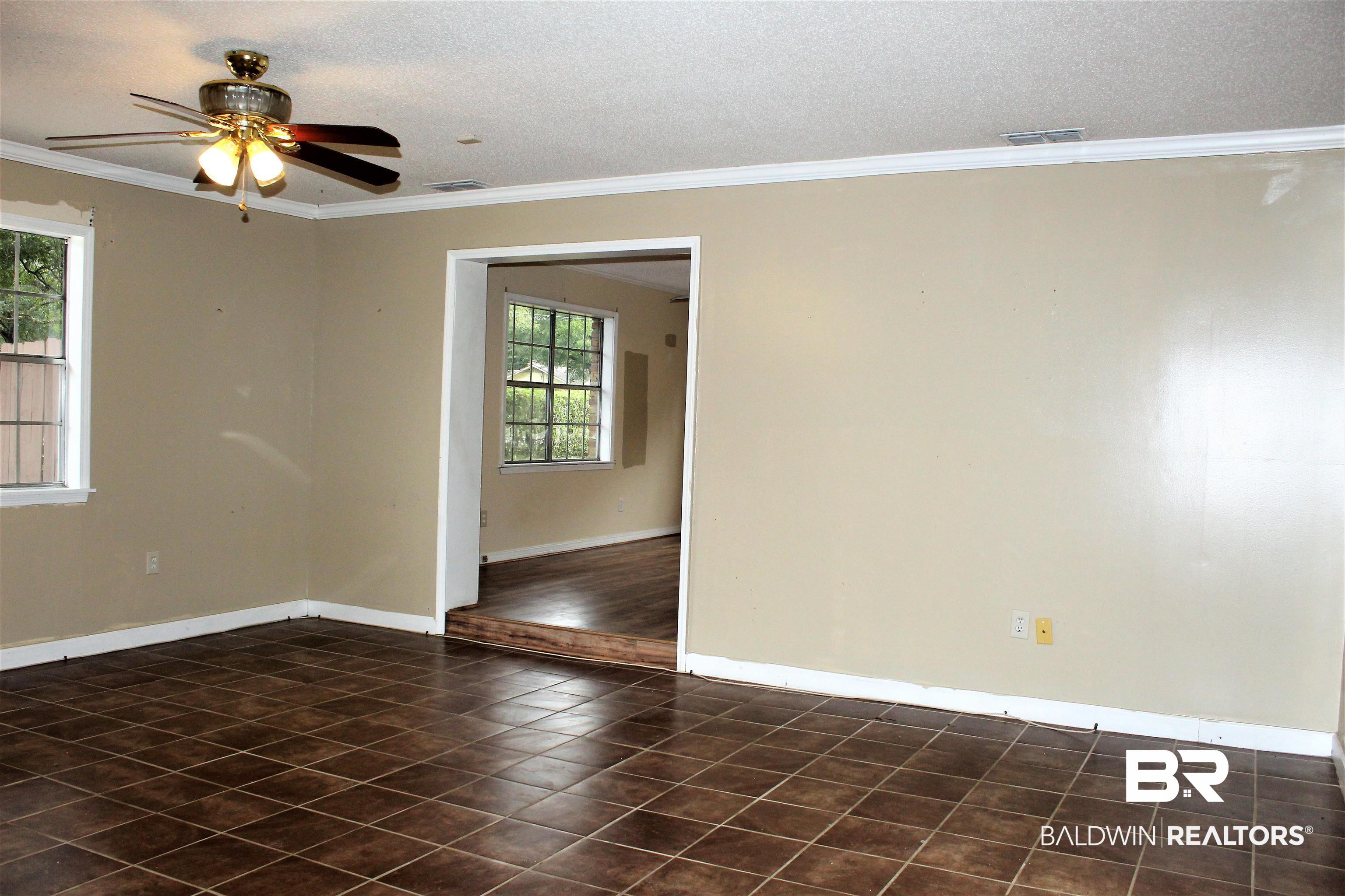 4251 Schillinger Road South Mobile, AL 36619 - Photo 19 of 38 Living room of Mother-In-Law Suite, sprt entrance